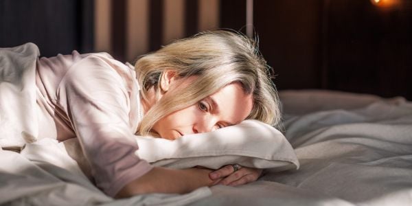 Homepage 25 Woman sleeping peacefully in bed